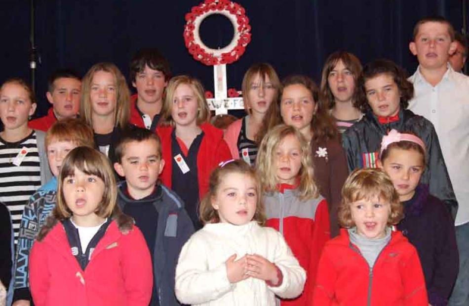 Pupils of Omakau and Poolburn Schools singing at the Omakau Anzac Day service. Photo by Lynda Van...