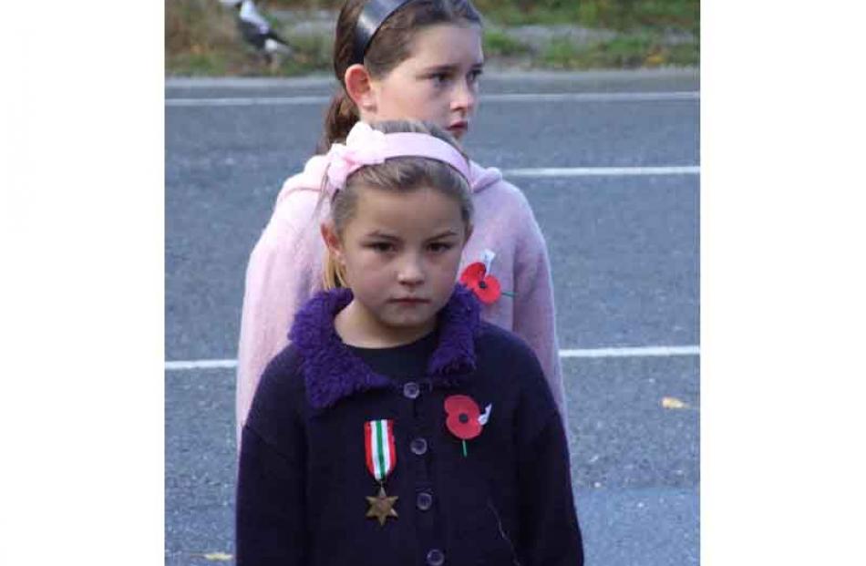 Eryn Scott (6) and sister Shaye (9), of Poolburn, wearing their great-grandfather Jack Sinnamon's...