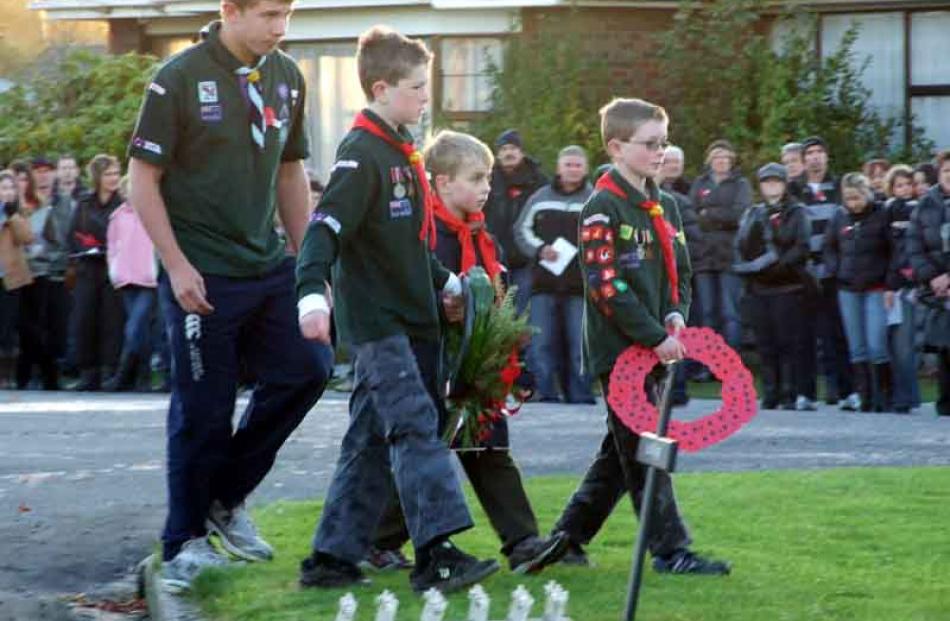 From left: Cameron Way (venturer), Jesse Maher (scout), Hugh Copland (kea), and Sam Maher (cub)...