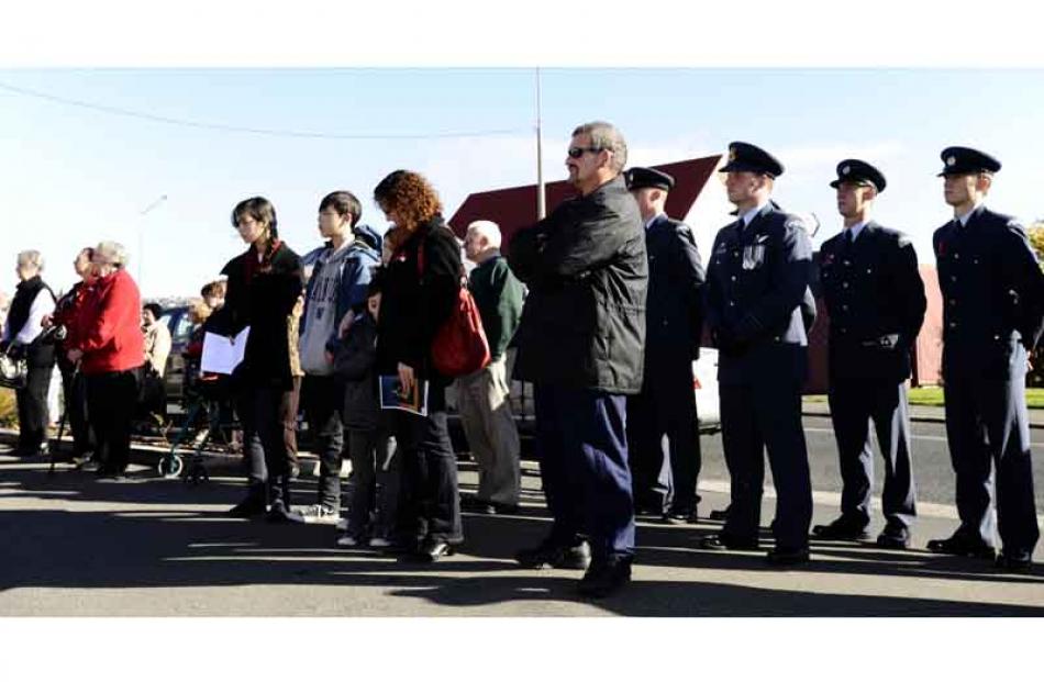 Members of the public pay their respects at the Anzac Day service at Montecillo Veterans home on...