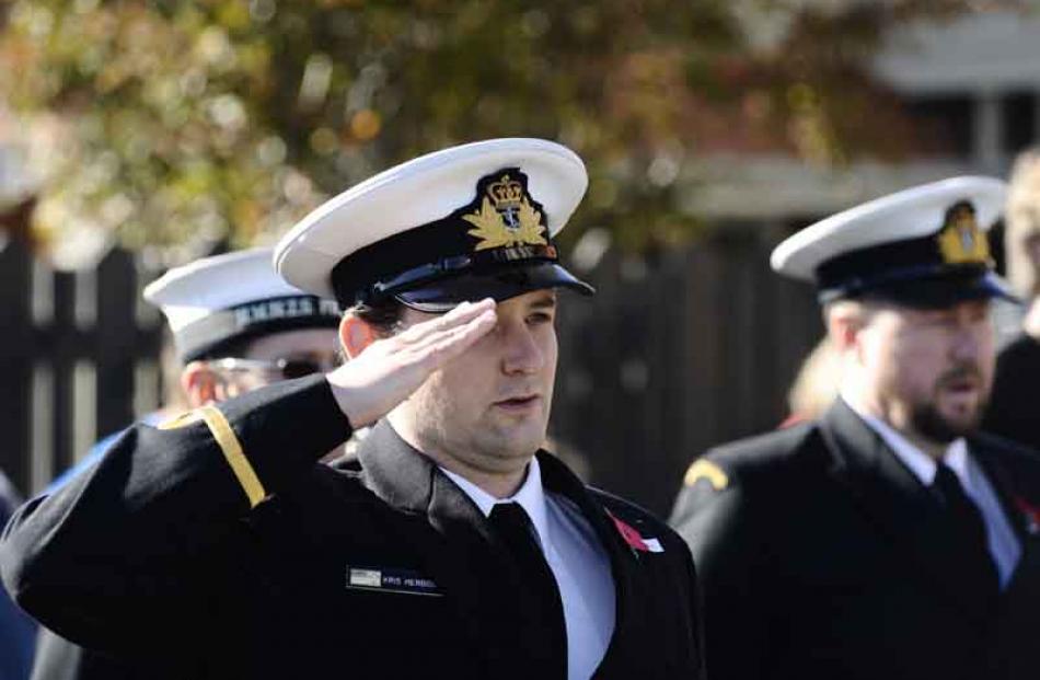 Sub-lieutenant  Kris Herbison (HMNZS PEGASUS) salutes at the Anzac Day service at Montecillo ...