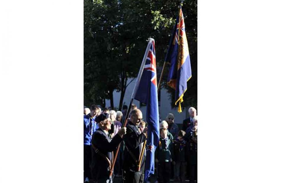 Flag bearers Arthur Elliott (left) and Tony Mobbs during the ANZAC Day service at the Mosgiel War...