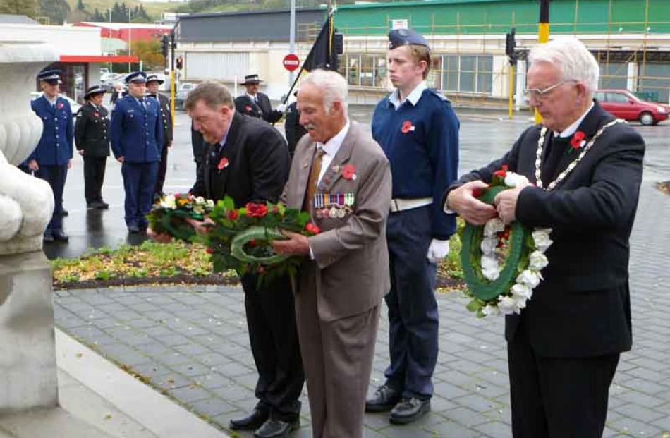 In honour . . . Anzac Day wreaths were laid at the Boer War monument in Oamaru yesterday by (from...