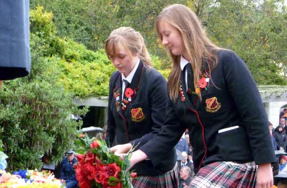 In memory . . . Waitaki Girls' High School pupils (from left) Nicole Meikle (17) and Jess...