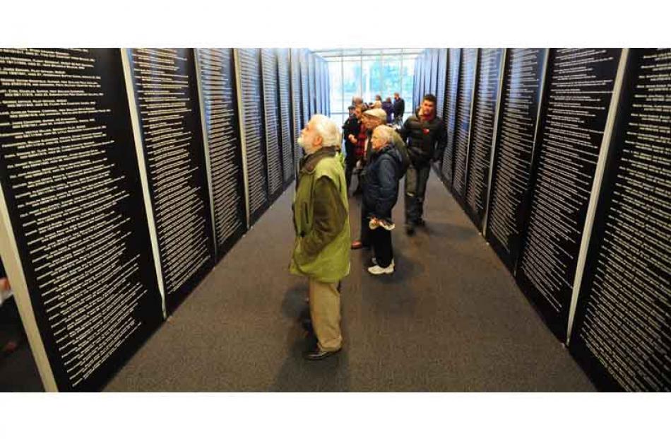 George Morris views the Settlers Museum Roll of Honour on ANZAC Day. Photo by Craig Baxter.