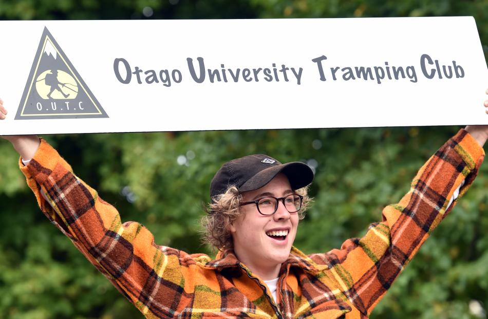 Otago University Tramping Club member Cameron Wright advertises at the Otago University Students'...