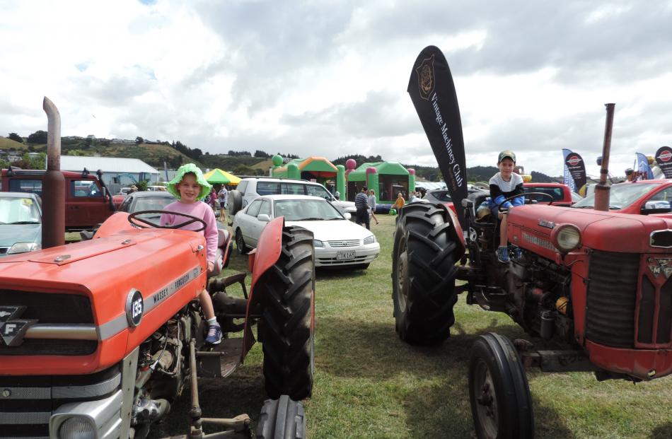 Isabelle (5) and Jordan (7) Wheeler "drive'' tractors in the North Otago Vintage Machinery Club display.