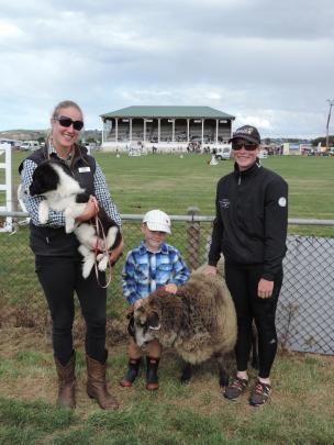 Byrin Flower (6) won prizes at the show for his border collie pup Pip (3 months), held by Lydia...