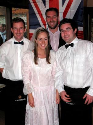 Bride for the night Clair MacDonnell with her Amsifield colleagues (from left) Gavin Lewis Tom...
