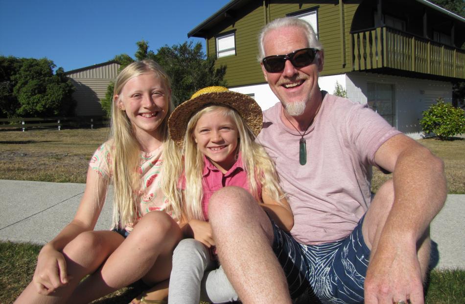 Isabella (12), Olivia (8) and Steven Noble-Kikbridge, of Lake Hawea.