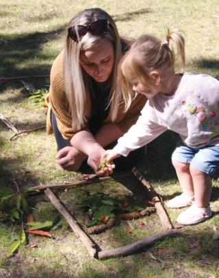 23-month-old Emily Neems of Te Anau enjoying her experience with nature creating her own...