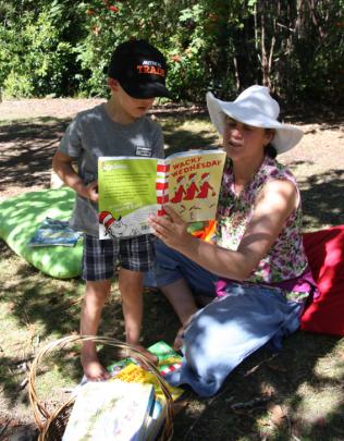 Lisa Sadler of Southern Stars Early Learning centre reading to 4 year old Rafe Woods of Te Anau...