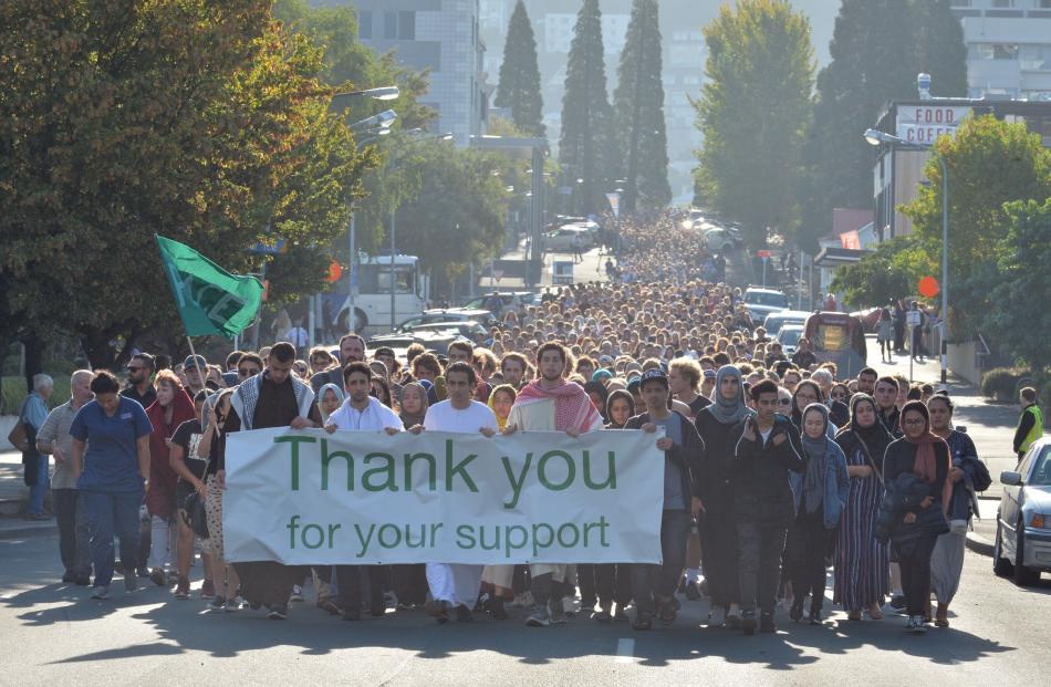 A huge crowd leaves the university on its way to Fosyth Barr Stadium ahead of the Dunedin vigil tonight. Photo: Gerard O'Brien