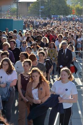  A huge crowd leaves the university on its way to Fosyth Barr Stadium ahead of the Dunedin vigil tonight. Photo: Gerard O'Brien