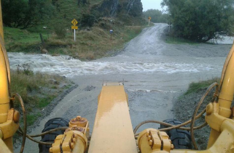 The often dusty gravel portion of Mt Aspiring Rd, from Wanaka to the Mt Aspiring National Park, was damp underfoot yesterday morning. Photo: QLDC