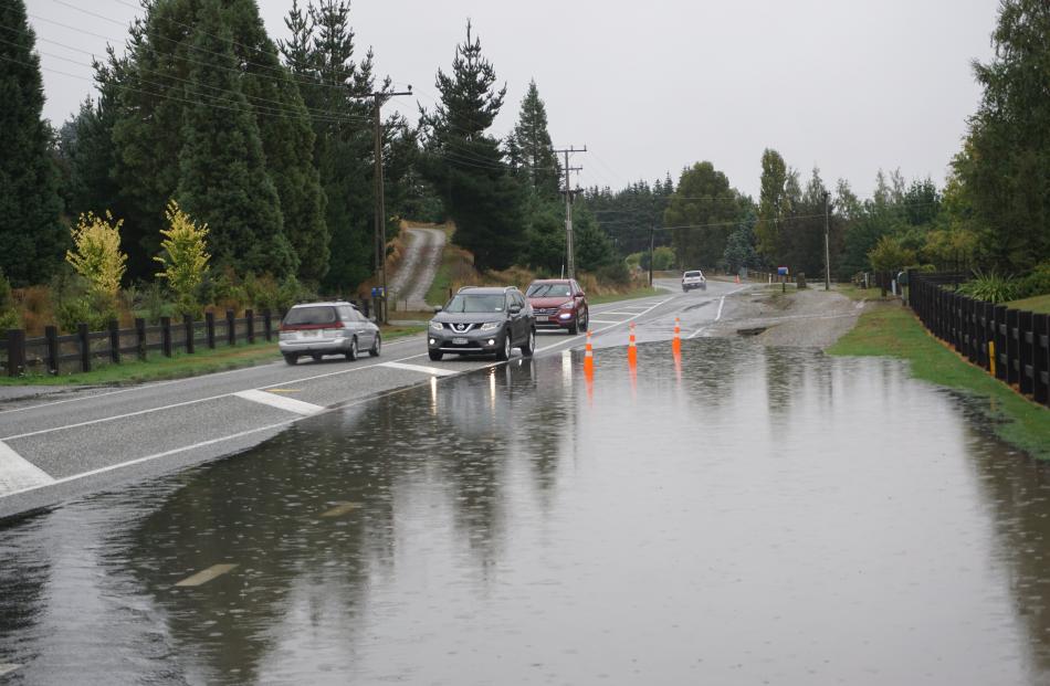 Not for the first time, substantial surface flooding of Aubrey Rd, in Wanaka, blocked off an...