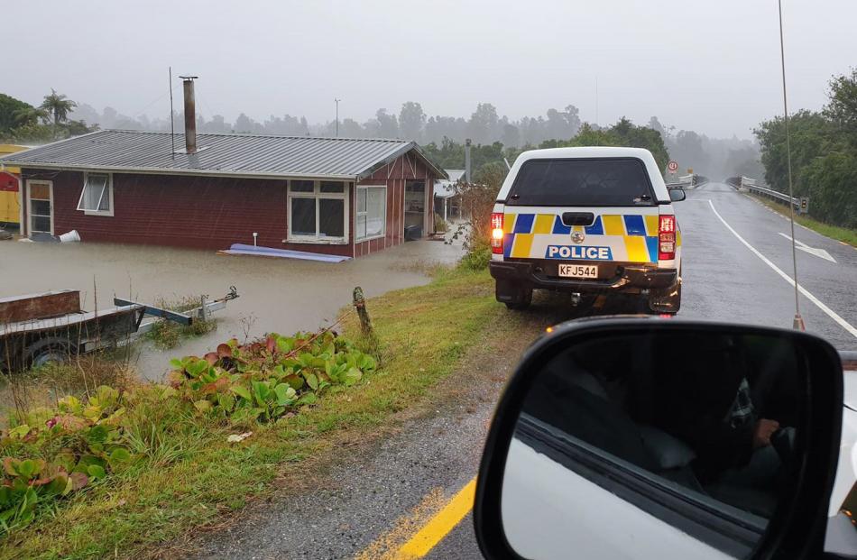 A house in Waiatoto, near Haast, was flooded after the area was hit by heavy rain. 
...