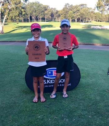 Kairangi and Anahera with their plaques. 