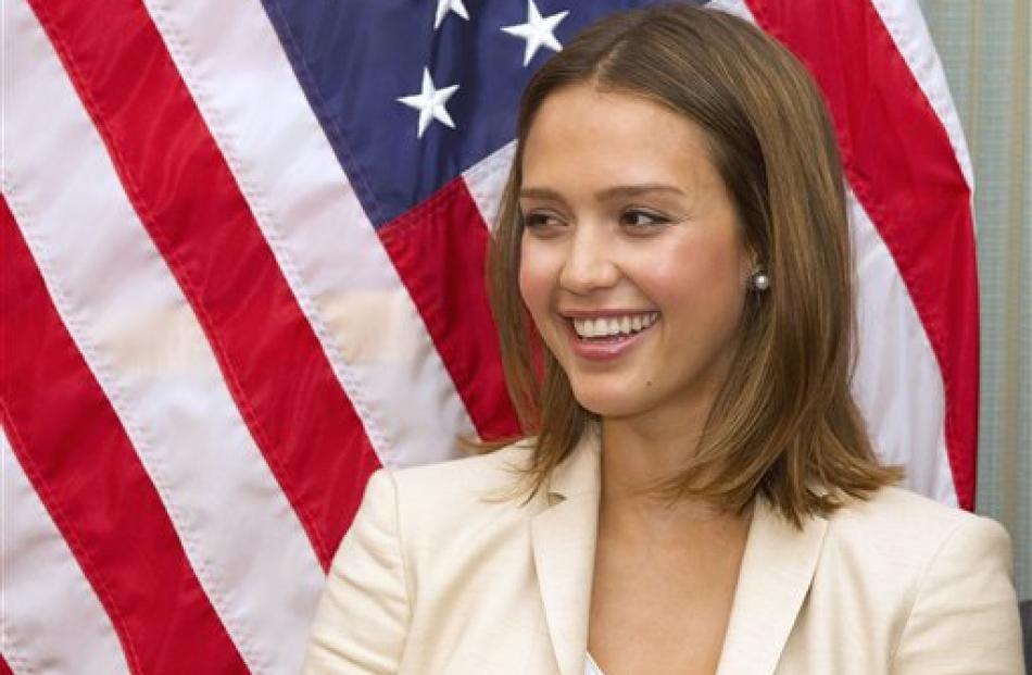 Jessica Alba attends a news conference on Capitol Hill in Washington to discuss keeping Americans...