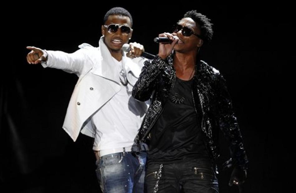 Trey Songz, left, and Lupe Fiasco perform at the MTV Movie Awards in Los Angeles. (AP Photo/Matt...
