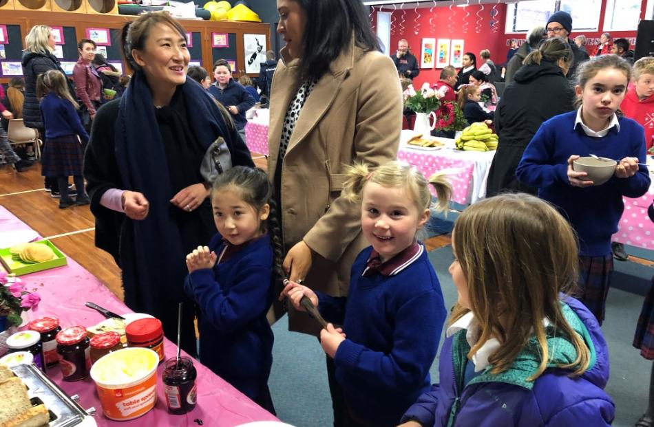 Hiromi, Talia, Raquel, Ruby and Sophie discuss what to eat next. 