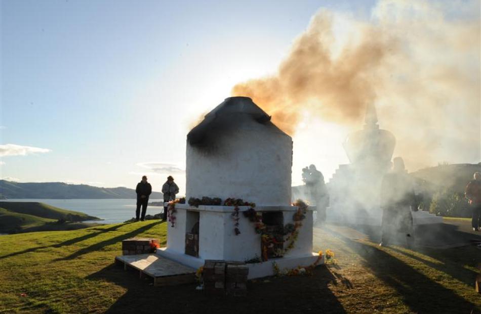 Smoke rises from the stupa. Photos by Stephen Jaquiery.