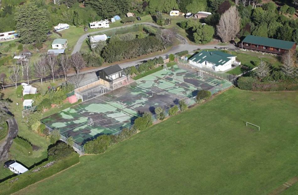 Liquefaction damage to tennis courts at Brighton.