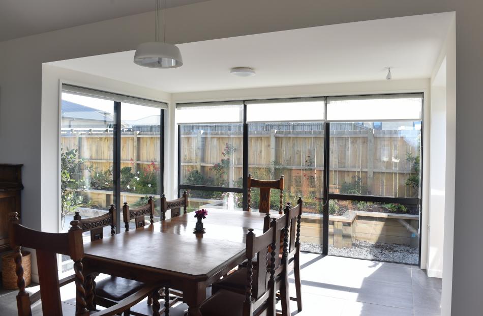 The oak dining table and chairs came from the Speight estate and were bought at auction many...