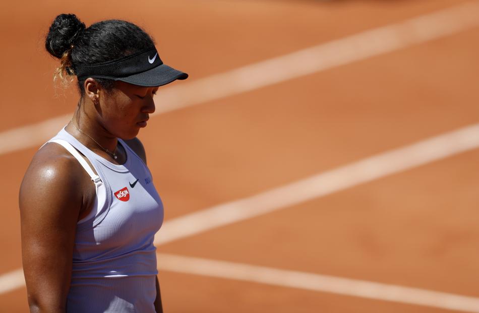 Naomi Osaka reacts during the match. Photo: Reuters