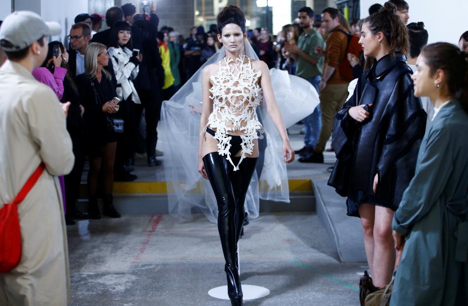 Models present creations during The Royal College of Art's Emerging Fashion Designer Show 'All at...