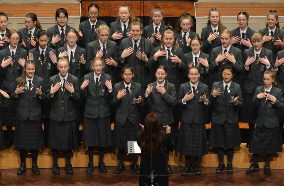 The Columba College junior choir directed by Anna Leese perform during the Big Sing at the...