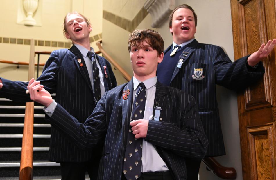 ACafellas choir members (from left) Mitchell Fox (17), Jamie Honey (16) and Tomuri Spicer (16)...