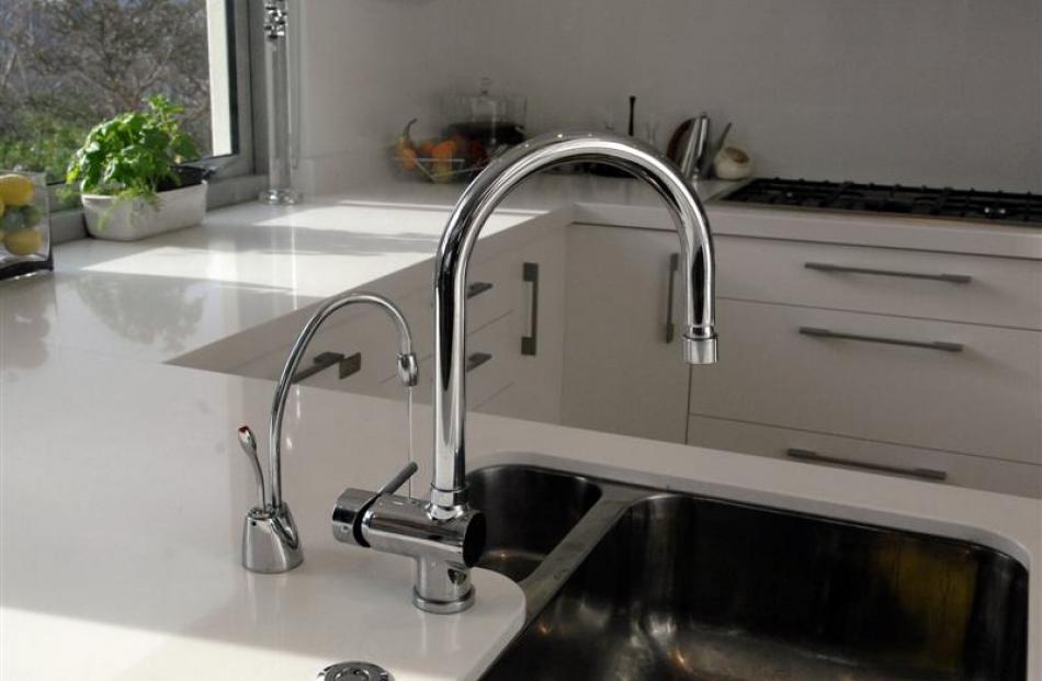 A favourite is the spout which is incorporated into the quartz work-top and delivers instant...