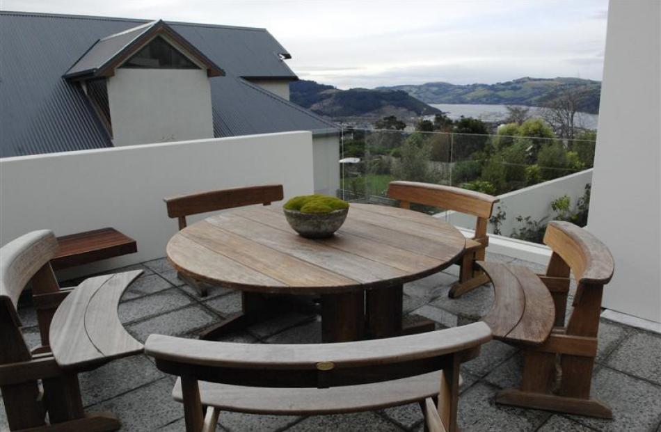 The outdoor dining area looks out over the harbour.