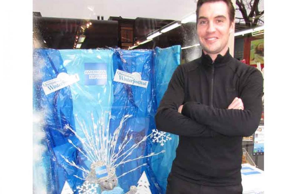 Paper Plus staff member James Anthony with the wonderland the team made from items in the shop,...