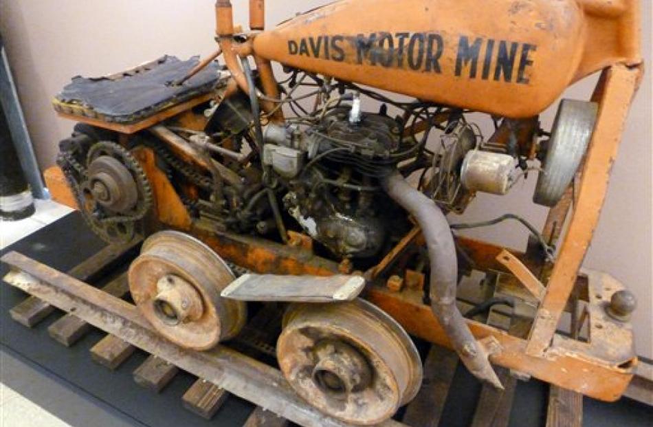 A mine vehicle, powered by a Harley motor, which was created by a mine worker in northern...