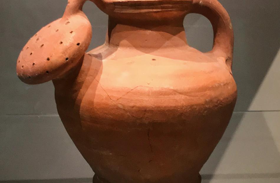 The design of a modern watering can is similar to this 450-year-old pottery one.