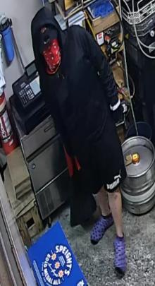 Police have now released photos of the offender who robbed the Traffers Bar in Gore at around 8.45pm on Sunday 30 June. Photo: Supplied