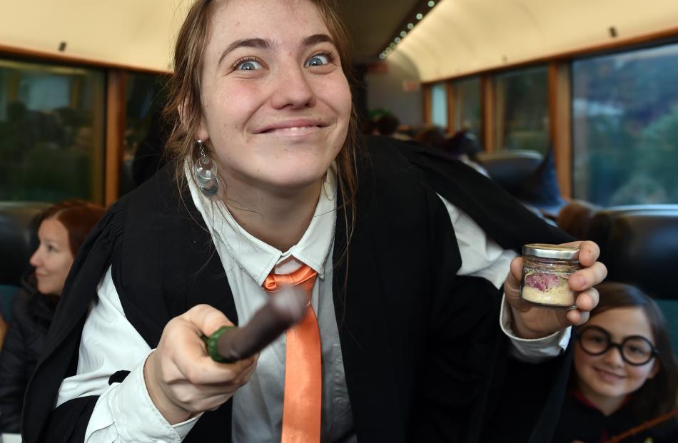 Casting a spell during a break from entertaining children yesterday is Matilda Macandrew, of...