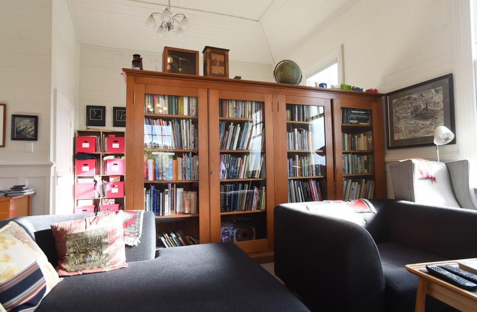 The kauri bookcase that separates the living area from the study was originally in the Hillside...