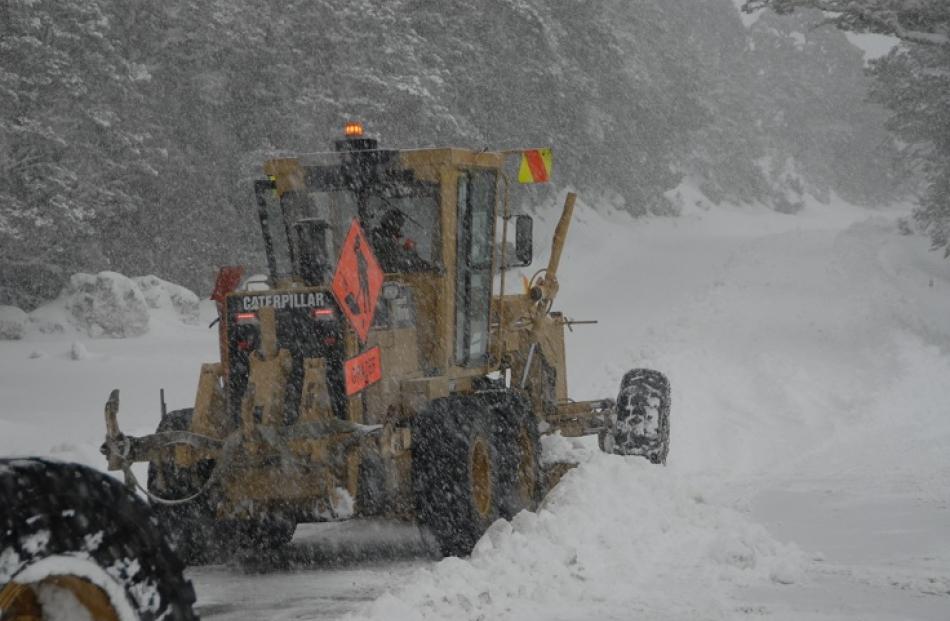 Snow clearing on SH94 near the Homer Tunnel. Photo NZTA-Downer Ltd
