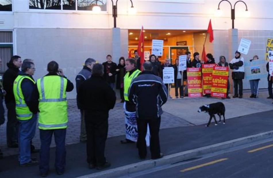 Sombre Hillside workers leave a meeting yesterday after being told up to 44 of them will lose...