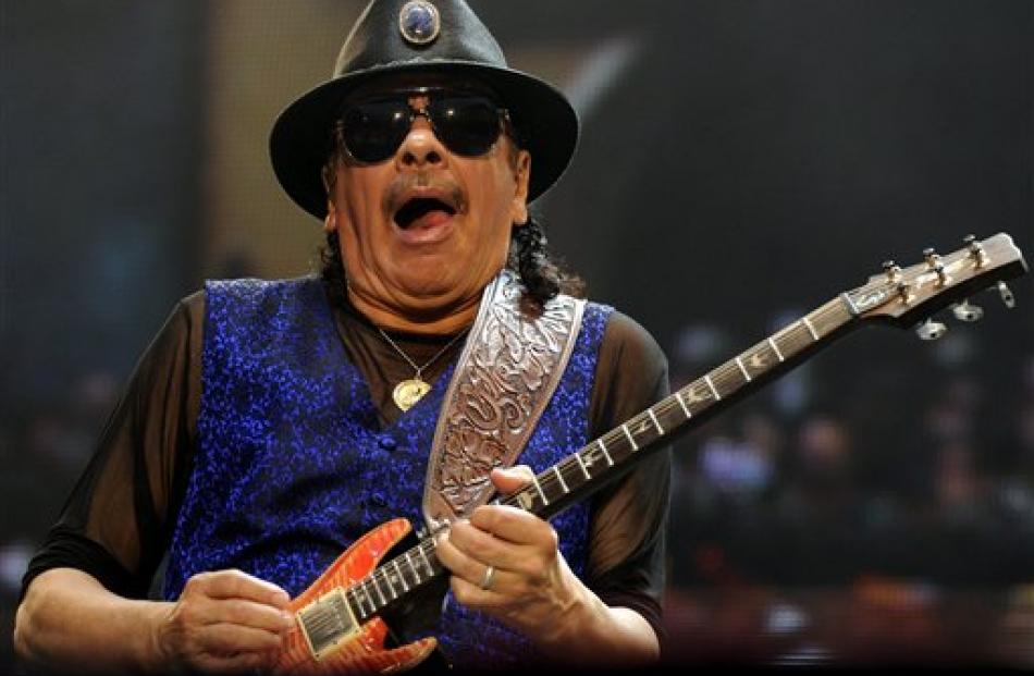Guitarist Carlos Santana performs at the Moon and Stars Festival in at the 'Piazza Grande' Square...