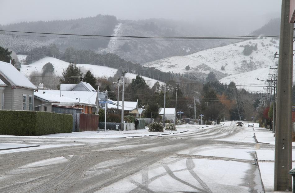 Milton earlier looking eastwards to wards snow covered streets and hills. Photo: John Cosgrove