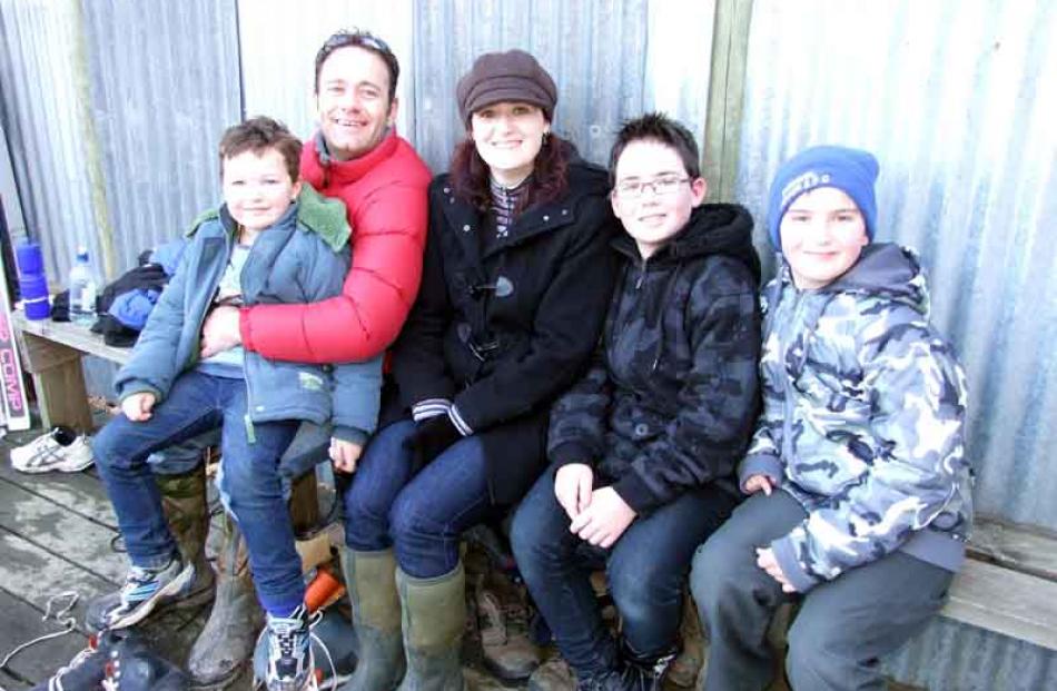 Simon Struthers and Lauren Blackwood, of Dunedin, with Trent (7), Jayden (12)and Callum (10)...