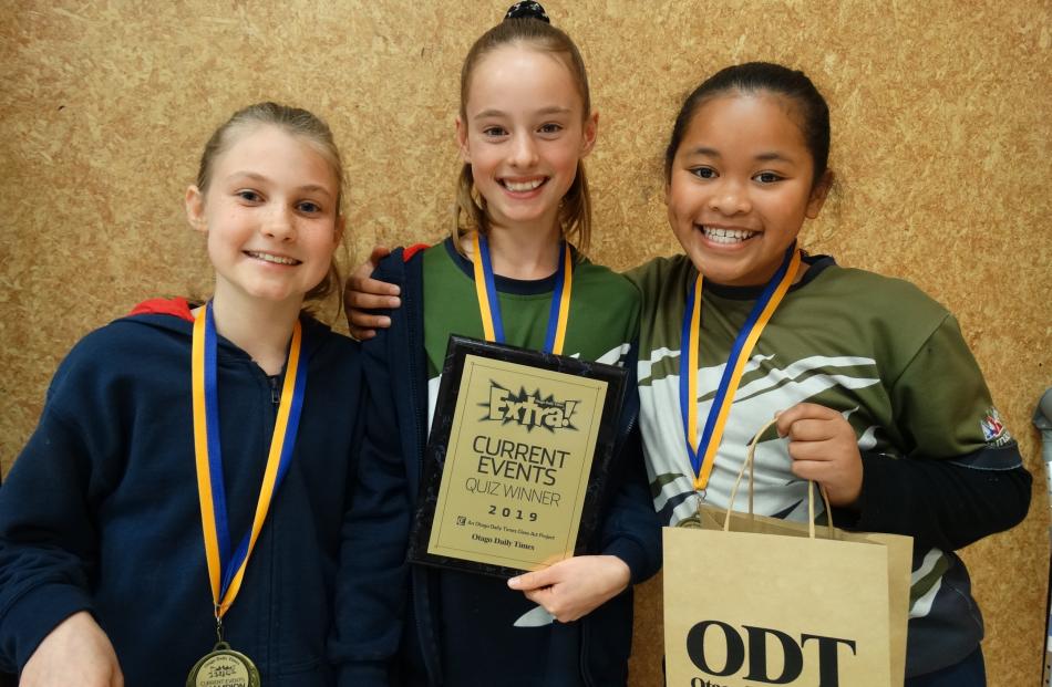 Showing off their winners’ plaque for years 5 and 6 are Remarkables Primary School pupils (from left) Indy Hamilton, Sasha Key and Maddy Tulafono (all 10). Photos: Guy WIlliams