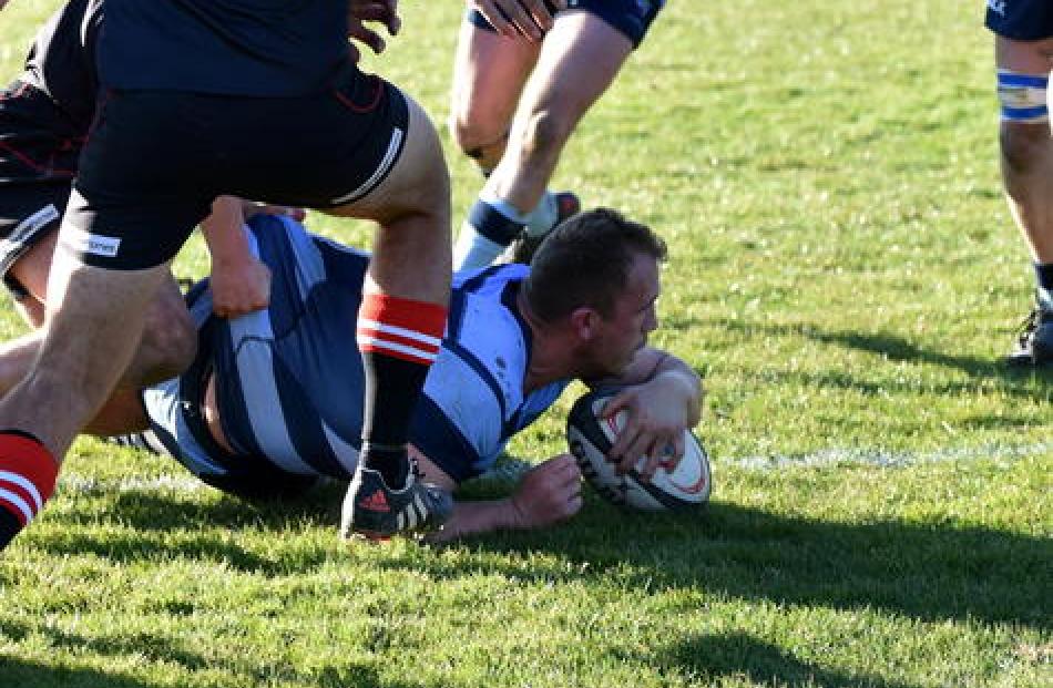 No 8 Daryl Lamborn scores a try in his blazer game. Photo: Karen Casey.