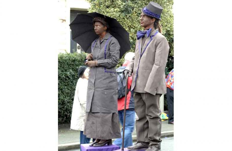 Highly Flammable performers Feather Shaw and Keiryn Harrington as chocolate statues at the...