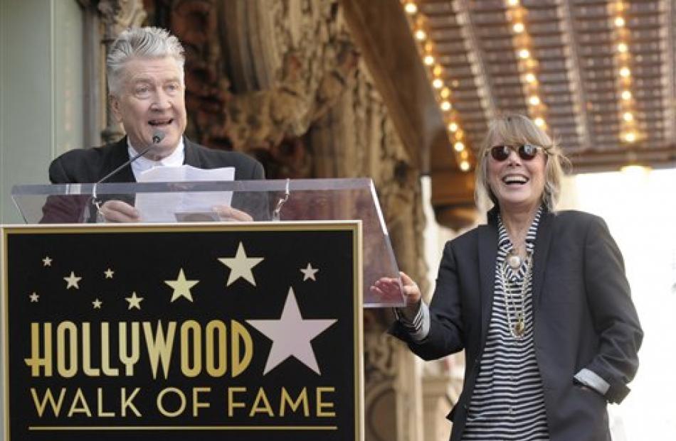 Director David Lynch, left, speaks as actress Sissy Spacek reacts while receiving a star on the...