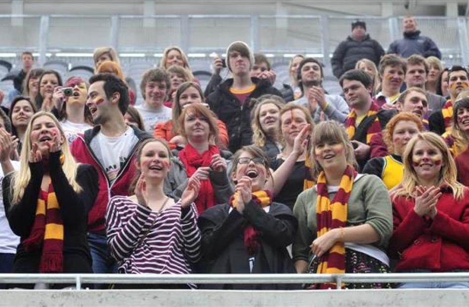 Selwyn College supporters cheer on their team. Photos by Craig Baxter.
